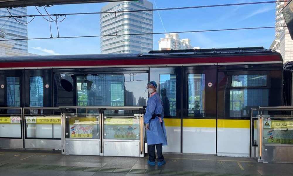 Shanghai reopens some public transport, still on high COVID alert